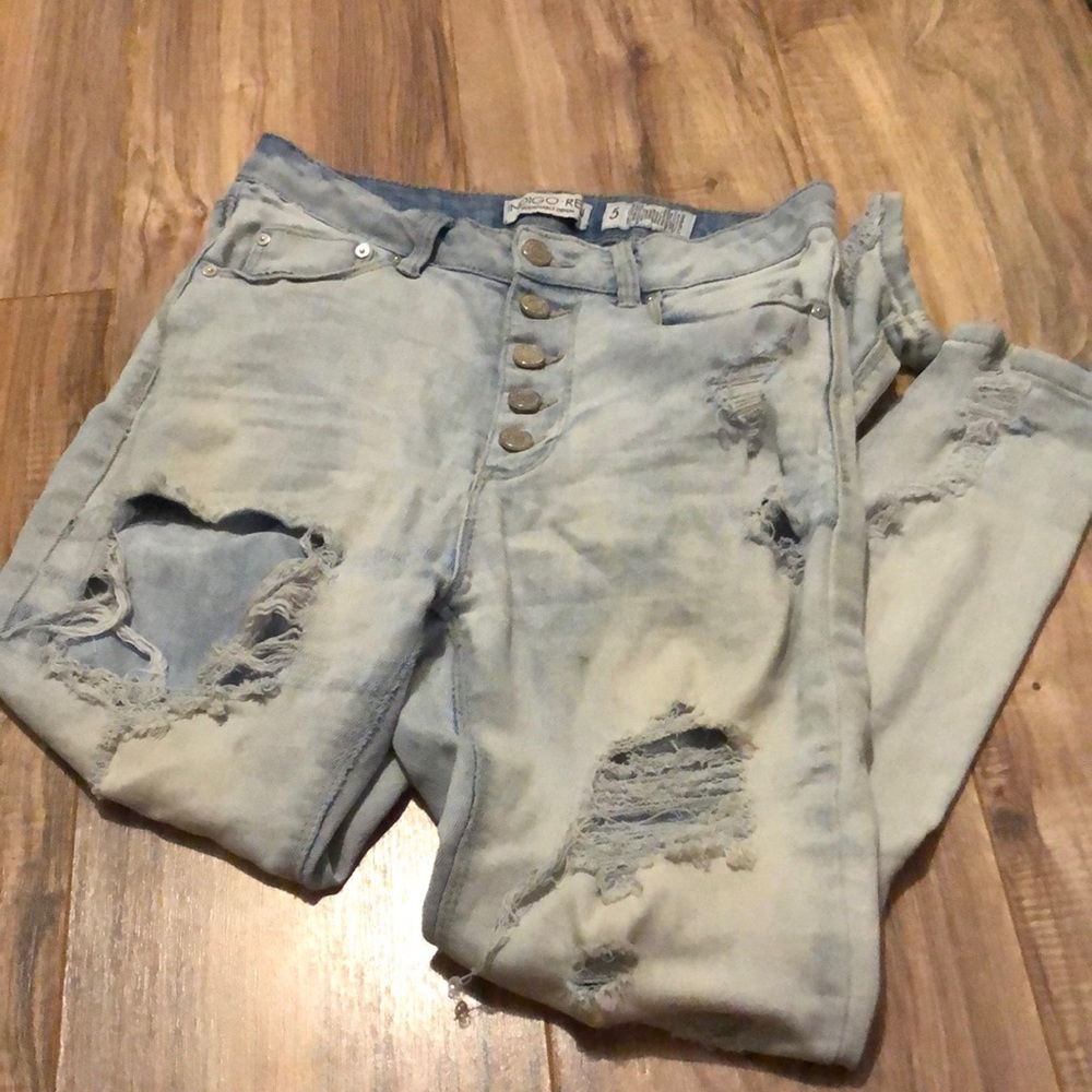 Light blue ripped jeans